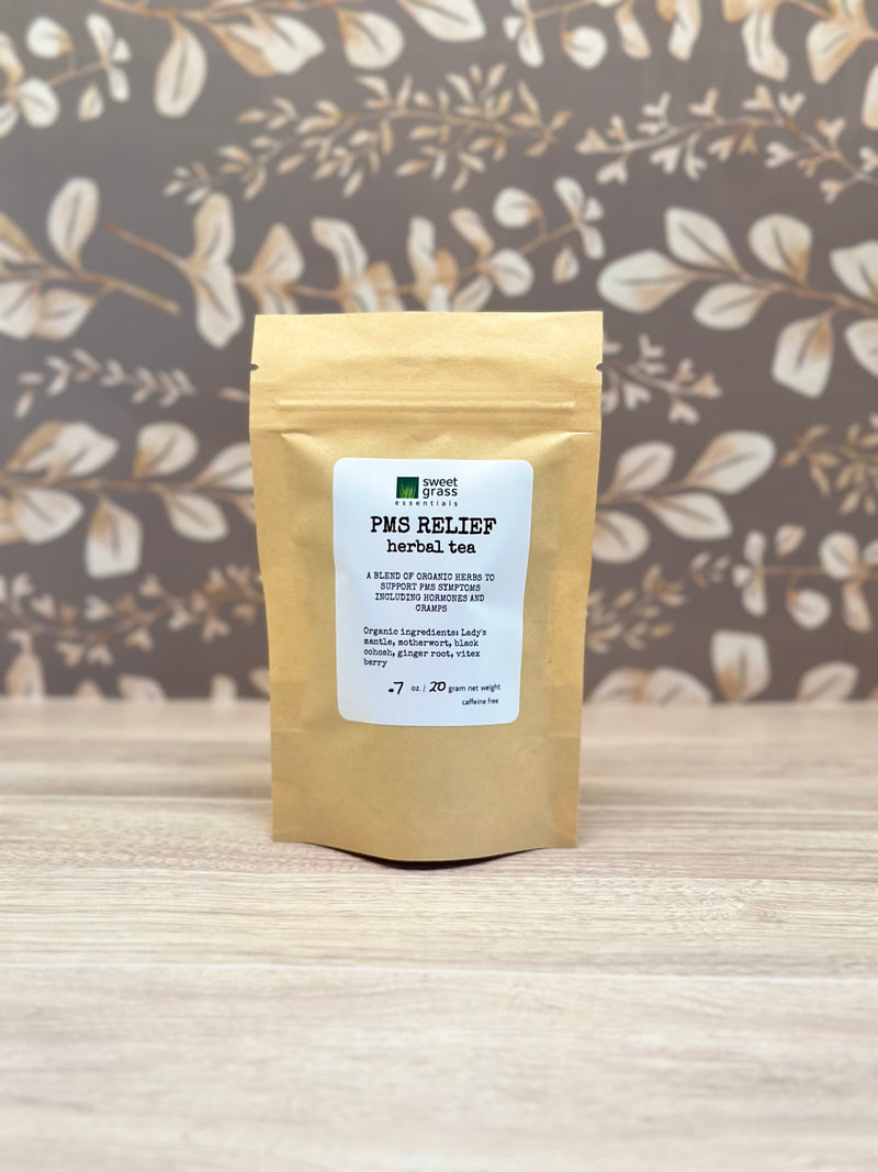 Kraft paper packaging with a label on a wooden surface and floral background